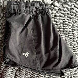 Black TNA shorts new condition never worn no liner .